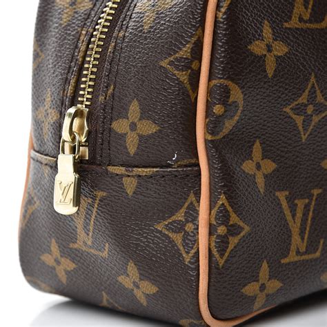 louis vuitton toilet bag.